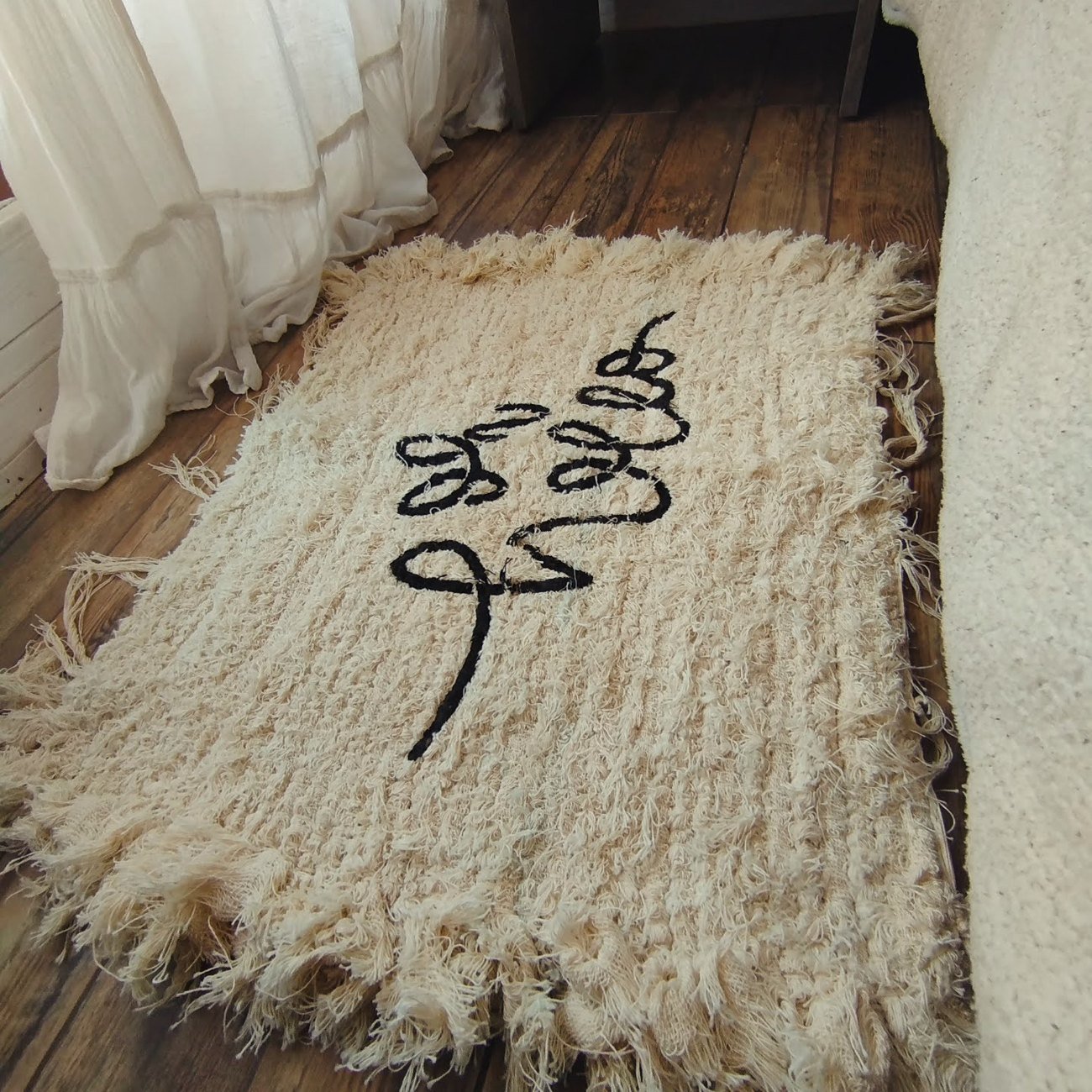 Alfombra con flecos